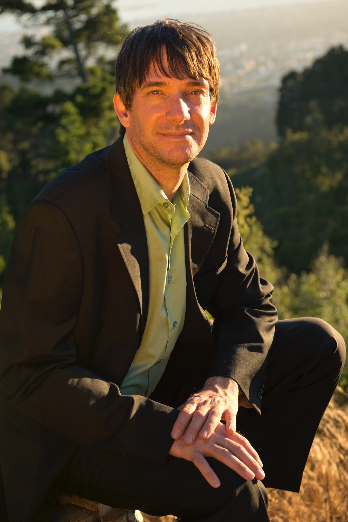 Dan at golden hour on a hillside