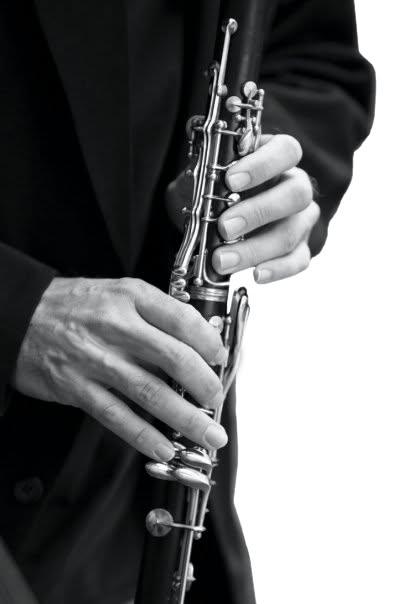 Hands on the clarinet keys